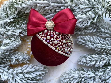 Elevate your Christmas decor with our Velvet Christmas Ornaments, adorned with sparkling rhinestones and elegant pearls. Handcrafted with premium velvet, these luxurious ornaments add sophistication and timeless beauty to your Christmas tree. ✅Handcrafted Quality: Each ornament is meticulously made with attention to detail, ensuring a unique, high-quality product. ✅Premium Materials: We use the finest velvet, rhinestones, and pearls for lasting beauty. ✅Exclusive Designs: Our unique ornaments ad Bling Christmas Ornaments, Bling Ornaments, Velvet Christmas Ornaments, Velvet Ornaments, Jeweled Christmas Ornaments, Christmas Glitter Ornaments, Fancy Christmas Ornaments, Rhinestone Ornaments, Xmas Baubles