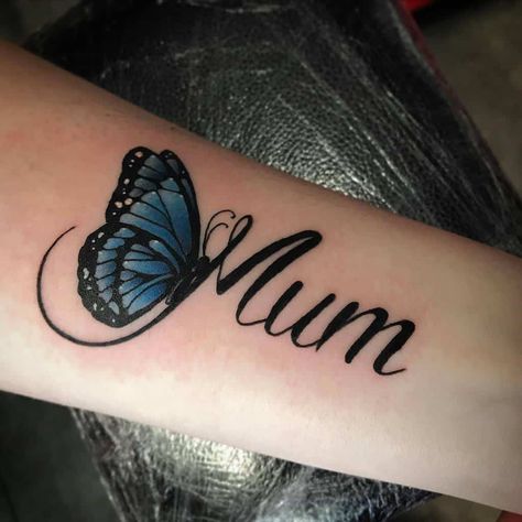 Blue Butterfly Tattoo On Hand, Cute And Unique Tattoos, Butterfly Tattoo Designs With Name, Names With Butterfly Tattoos, Mum Butterfly Tattoo, Buttflies Tattoo On Arm, Word Butterfly Tattoo, Rip Mom Tattoo Ideas For Daughter Sleeve, Mum Tattoo Ideas For Daughter