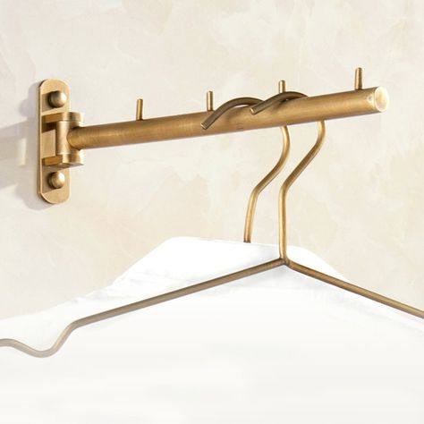 This robe hook can be installed in a bathroom or back of the door, purchase from Homelava.com to have a lower price and higher quality. Brass Clothes Rail, Clothing Rods On Wall, Brass Clothes Rod, Brass Robe Hook, Brass Closet Hardware, Laundry Room Clothing Rod, Laundry Room Wall Hooks, Back Of Door Hooks, Brass Closet Rod