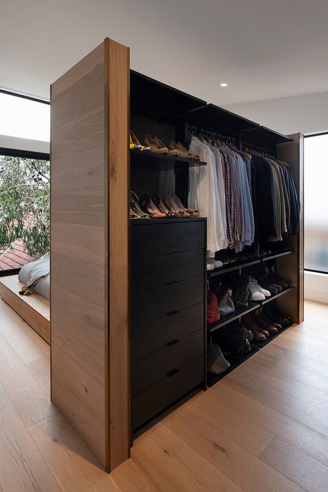 Walk-in wardrobe of master bedroom acts as room divider Walk In Wardrobe Behind Bed Wall, Bedroom Divider Closet, Room Divider Wardrobe, Small Walkin Wardrobe Ideas, Walking Wardrobe Ideas Small Spaces, Wardrobe As Room Divider, Wardrobe Behind Bed Wall, Wardrobe Wall In Bedroom, Long Narrow Walk In Closet