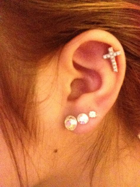 Triples and Cartilage piercings of my own! #triples #cartilage #cross #earring Latina Vibes, Cross Earring, Christian Accessories, Piercing Inspo, Cool Ear Piercings, Cartilage Piercings, Cool Piercings, Cute Ear Piercings, Cute Piercings