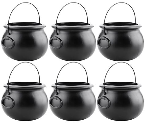 PRICES MAY VARY. Durable Construction: Crafted from durable plastic, these cauldrons are built to withstand the test of time and ensure many Halloweens of spooky fun. Spooky Design: The cauldrons feature a classic witch's cauldron design, complete with faux rivets and handles, evoking a mysterious and magical atmosphere. Variety of Sizes: we have a different cauldron sizes from 6 inches to 22 inches to hold a variety of Halloween treats, candies, or even use them as a creative centerpiece for yo Halloween Cauldron, Witch's Cauldron, Creative Centerpieces, Candy Making Supplies, Christmas Tabletop, Tabletop Christmas Tree, Candy Holder, Spooky Designs, Halloween Party Favors