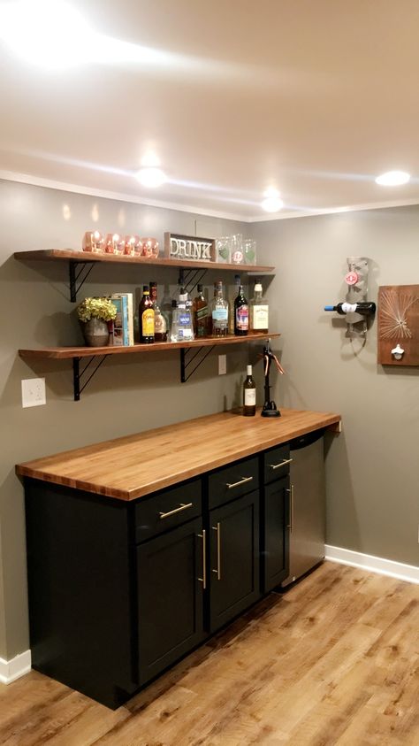 Basement bar homemade counter and exposed shelves Dry Bar For Basement, Basement Counter Bar Ideas, Basement Shelves Decor, Bar Area In Garage, Small Bars For Basements, Small Bar Ideas For Basement, Dry Basement Bar, Wall Cabinet With Drawers, Homemade Basement Bar