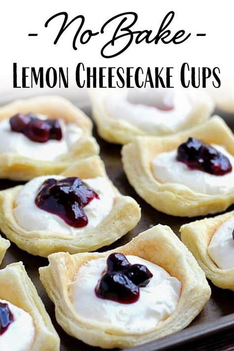 No-Bake Lemon Cheesecake Cups with Blueberry Sauce - the perfect little no-bake dessert treat for the summer season! These delicious little lemon cream cheese bites are easy to make, yet a very impressive dessert for all occasions. You can use pre-made puff pastry shells, or make your own. | #dlbrecipes #nobakecheesecake #lemoncheesecake #dessert Lemon Cheesecake Cups, Puff Pastry Cups, Cream Cheese Bites, Puff Pastry Shells, No Bake Lemon, Impressive Dessert, Easter Food Appetizers, Desserts Summer, No Bake Lemon Cheesecake