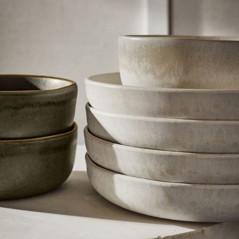 Expert craftsmanship leaves its mark on the Drift Pasta Bowl. Hand-pressed with a curved bottom and straight edges, wide stoneware form is coated with a matte ivory water-reactive glaze that behaves beautifully when kiln-fired. What surfaces is a subtle crackled texture in a rich tonal mix that makes each piece unique. Part of the Drift Reactive Ivory Dinnerware collection; also looks great with Drift Dinnerware in both lavender and green. CB2 exclusive.     Handmade  Stoneware  Matte ivory and West Elm Dinnerware, Stoneware Dinner Plates, Clay Pasta Bowl, Dish Ware Sets, Stoneware Serving Dishes, Mid Century Modern Dishware, Pottery Serving Bowls, Diningware Set, Pasta Bowls Pottery