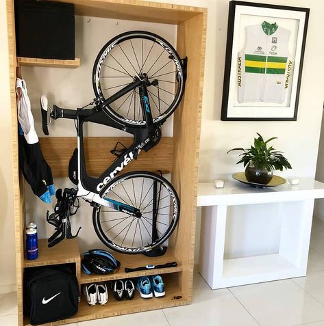 11 Indoor Bike Storage Ideas You'll Love (Small Spaces) | GoDownsize Store Bike In Small Apartment, Indoor Bike Storage Small Spaces, Bike Helmet Storage, Bike Storage Small Space, Bike Storage Ideas, Bike Storage Home, Fitness Corner, Bike Storage Room, Bike Storage Apartment