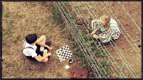 An overhead view of the boys sitting playing a game of checkers Pajamas Quotes, Boy In Striped Pyjamas, Boy In The Striped Pajamas, John Boyne, Striped Pajamas, Fav Movies, Girl Movies, Striped Pyjamas, Film Quotes