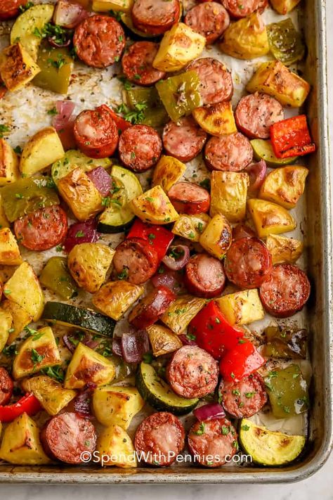 Smoked sausage, zucchini, with peppers and onions is a yummy combination for roasted sausage and potatoes. It's the best and tastiest sheet pan meal ever. #spendwithpennies #roastedsausageandpotatoes #entrée #recipe #oven #onepan #peppers #roasted #sheetpan #easy Berry Fluff, Pretzels Homemade, Sausage Potatoes And Peppers, Beef Burritos, Strawberry Fudge, Sausage Peppers And Onions, Blueberry Buckle, Smoked Sausage Recipes, Ziti Recipe