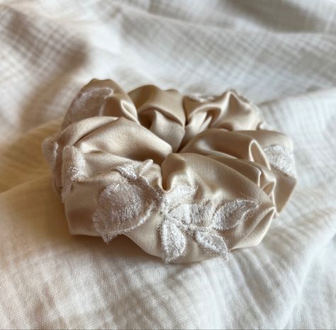 Want to wear the prettiest parts of your wedding dress every day? Have a cute bespoke scrunchie made and you can! You only need a few scraps of lace for this scrunchie so you may even be able to have one made with off-cuts from your alterations! You can either have little lace elements carefully added to my ivory or champagne satin bases, or you can have the scrunchie made entirely from your own fabrics (don't worry, I'll still supply the elastic!) #weddinggift #scrunchie #weddingkeepsake Wedding Scrunchie, Bridal Scrunchie, Bridal Alterations, Something To Remember, Wedding Keepsakes, Sweet Memories, Scrunchie Hairstyles, Wedding Accessories, Scrunchies