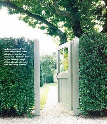 This gate mimics a front door with the windows and size. Surrounded by the privet hedge, there is no guessing where the entrance is located.  Image from House & Garden. Boxwood Fence Front Yard, Hedge With Gate Entrance, Painted Privacy Fence, Hedge Fence, Privet Hedge, Garden Gates And Fencing, Boxwood Garden, Backyard Privacy, Evergreen Plants