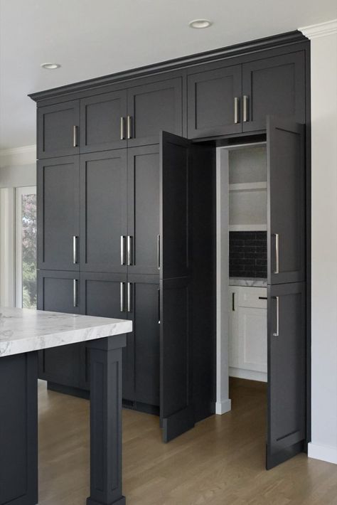 kitchen remodel with tall dark cabinets hidden pantry inside Kitchen With Secret Pantry, Pull Up Kitchen Cabinet Doors, Open Kitchen Diner, Secret Kitchen Pantry, Walk In Pantry Behind Kitchen Wall, Hidden Utility Room In Kitchen, Cabinet Wall Kitchen, Cool Home Features, Hidden Pantry Walk In