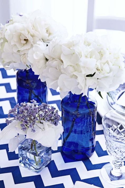 Cobalt Blue Wedding Centerpieces, Cobalt Blue Flowers, Blue Glass Wedding Centerpieces, Greek Style Party Decorations, Cobalt Blue Centerpieces, Cobalt Wedding Theme, Talavera Wedding Decor Blue And White, Mama Mia Centerpieces, Blue And White Centerpieces For Party