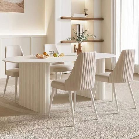 Our stunning contemporary modern dining table set. * White Stone Slate Top * Wooden accents with new design * Chairs included in the set * Choose between 4 and 6 Seater #diningtables #moderndiningroom #homeinteriordesign #dubaihomeinterior #moderndiningset #contemporaryhome #whitefurniture #dubaihomefurniture #dubaifurniture #uaefurniture Kitchen Island Mobile, Contemporary Modern Dining Table, Kitchen Bar Table, Modern Dining Table Set, Dining Sets Modern, Oval Table Dining, Dining Living Room, Dining Table Set, Decor Home Living Room