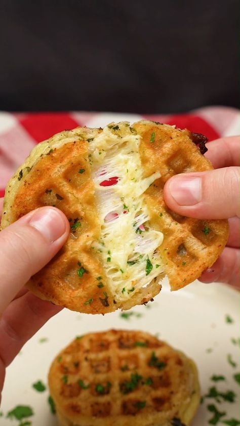 162K views · 207 reactions | GARLIC BREAD WAFFLES🤤 Waffle Hack! These super cheesy garlic bread waffles are a game changer if you LOVE garlic bread. Crispy and oozy, they’re the perfect treat! 🧄Cut out 3 slices of bread with a glass and spread each slice with garlic butter on both sides 🧇Place a slice onto a waffle maker, add mozzarella, a slice of bread, repeat x2 🧄Cook until golden and oozy, around 5 mins 🧇Garnish with fresh parsley | Planet Food | Lost Son · Blossom Mini Waffle Recipe, Dinner Recipes With Chicken, Waffle Iron Recipes, Recipes With Chicken, Waffle Maker Recipes, Cheesy Garlic Bread, Recipes Crockpot, Food Recepie, Waffle Recipes