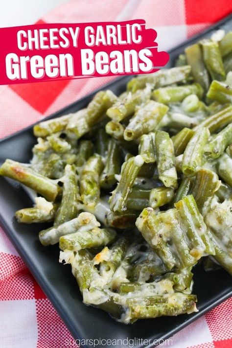 Cheesy green beans with a hit of salty, tangy flavor from garlic and parmesan! This easy vegetable side dish is perfect for picky eaters and a great last-minute option using fresh or frozen green beans. Recipes With Frozen Green Beans, Cheesy Garlic Green Beans, Cheesy Green Bean Recipes, Garlic Parmesan Green Beans, Parmesan Green Bean Recipes, Green Bean Side Dish Recipes, Cheesy Green Beans, Easy Veggie Side Dish, Green Beans Side