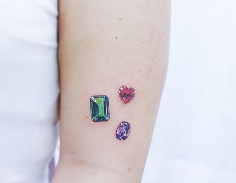 Grandma - Ruby, Mom - emerald/blue topaz, Me - Amethyst Minimalist Tattoo Meaning, Stone Tattoo, Gem Tattoo, Typography Tattoo, Jewel Tattoo, Tattoos Mandala, Delicate Tattoo, Jewelry Tattoo, Subtle Tattoos