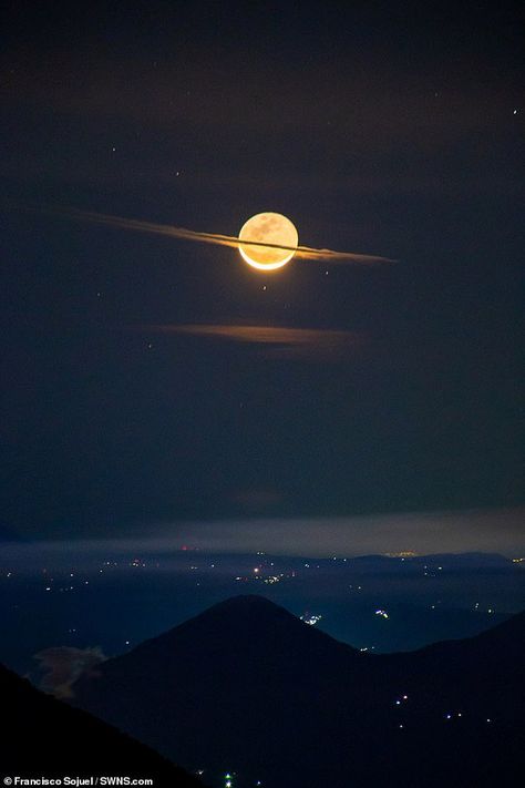 The moon disguised as Saturn as clouds form rings around it, above the base camp of volcan... Cirrostratus Clouds, Ring Around The Moon, Moon Photos, Before Sunrise, Adventure Photography, Aerial Photo, The Night Sky, Unique Image, Photography Website