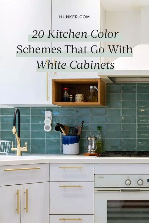 Whether you are thinking of installing white cabinets in your kitchen or you're looking to freshen up your existing cook space, selecting accent colors can be somewhat daunting. #hunkerhome #kitchen #kitchencolor #kitchencolorscheme Colourful Kitchen White Cabinets, White Kitchen With Pop Of Color, White Cabinets Color Backsplash, White Cabinets Colored Walls, Kitchen White Cabinets Colored Walls, White Kitchen With Accent Color, Small Kitchen Colours Ideas, Kitchen Wall Paint Colors White Cabinets, Colorful Kitchen With White Cabinets