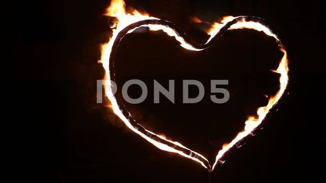 Fiery heart. A heart shape glowing with fire. The video was shot late at nigh Stock Footage #AD ,#glowing#fire#shape#Fiery Burning Heart Aesthetic, Fire Heart Video, Fire Heart Emoji, Burning Heart Video, Heart Fireworks Aesthetic Video, Fire Video, Aesthetic Template, Video Footage, Stock Footage