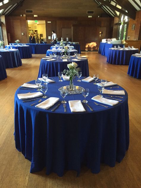 Midnight Blue Table Cloth, Royal Blue Round Table, Navy Chair Covers Wedding, Royal Blue Tablecloth, Red And Navy Blue Wedding Centerpieces, Royal Blue Tablescape, Royal Blue And White Decorations Party, Midnight Blue Table Setting, Royal Blue And Silver Table Settings