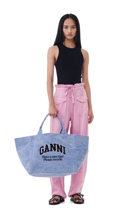 This Blue Oversized Canvas Tote Bag features two handles and an embroidered GANNI logo. GANNI Blue Oversized Canvas Tote Bag in Light Blue Vintage | Women's | Recycled Cotton Money Pouch, Embroidered Tote Bag, Oversized Tote Bag, Embroidered Tote, Oversized Tote, Tshirt Skirt, Bag Light, Blue Vintage, Shopper Bag