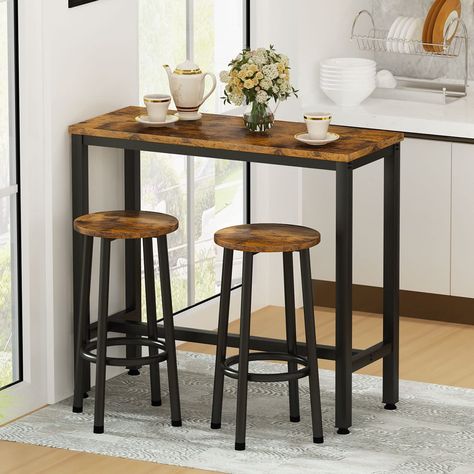 PRICES MAY VARY. 【3-Piece Pub Table Set 】This classic counter height bar set includes a 39.3" bar table and 2 bar stools, Industrial design will be never out of date , suitable for studio apartment, tiny condo, kitchen&dining room or entryway. 【Compact design】This table set will be a perfect working partner for small spaces. It is just the perfect size and height for you while seating. 2 Chairs can put under the table when not in use, it looks more tidy and solve your space concerns. 【High Quali Pub Height Table, Pub Dining Set, Breakfast Bar Table, Counter Height Dining Table Set, Counter Height Table Sets, Bar Table Set, Modern Kitchen Tables, Bar Table And Stools, Bar Table Sets