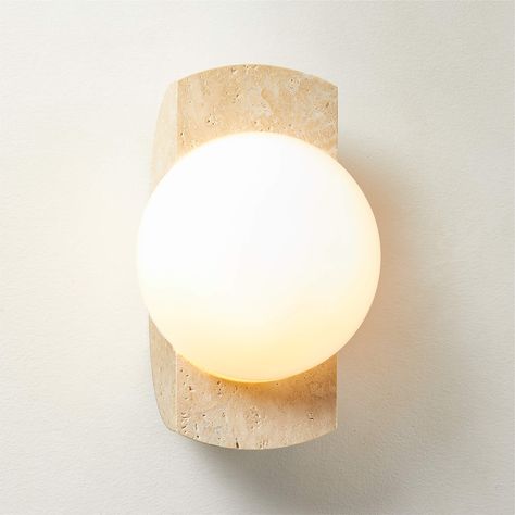 Neptune Travertine Wall Sconce + Reviews | CB2 Unlacquered Brass Hardware, Ivory Travertine, Travertine Wall, Sphere Light, Silver Walls, Modern Wall Sconces, Marble Wall, Taper Candle Holders, Unlacquered Brass