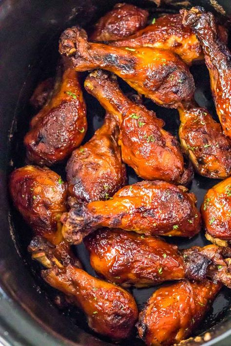 Get ready to sink your teeth into tender and flavorful slow cooker BBQ chicken legs. With minimal effort, these juicy drumsticks are coated in a tangy and smoky barbecue sauce that everyone will love. Perfect for busy days or laid-back gatherings, this easy slow cooker recipe is a crowd-pleaser that'll keep you coming back for more! Bbq Chicken Legs Crockpot Drumstick Recipes, Chicken Legs For A Crowd, Chicken Drumsticks In Slow Cooker, Chicken Legs In Slow Cooker, Slow Cook Chicken Drumsticks, Crockpot Bbq Drumsticks, Barbecue Chicken Legs In Crockpot, Crockpot Bbq Chicken Drumsticks, Crockpot Bbq Chicken Legs Easy