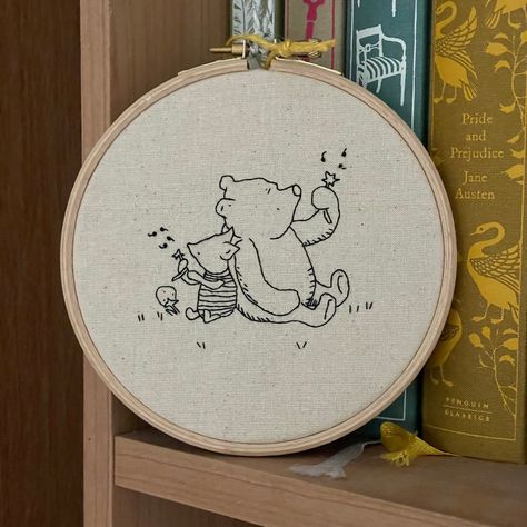 Pooh bear with balloon Modern embroidery fibre art wall hanging Natural linen with black thread, pooh bear and Piglet are hand embroidered on to it. Framed in a wooden hoop which is 5.5 inches high, 5 inches wide and 2.5 cm deep and backed with felt. If you are ordering the embroidery with an added name and date, please leave me a note at check out with the correct name and spelling. Great for adding a touch of character to a space and for adding a personal touch to any room. Especially a Nurser Embroidery Nursery Decor, Pooh Bear Embroidery, Cute Bear Embroidery, Nursery Embroidery Ideas, Embroidery For Baby Boy, Pooh Bear Nursery, Embroidery For Baby, Winnie The Pooh Embroidery, Pooh Embroidery