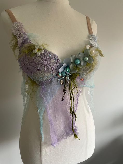 Beautiful Ethereal Mer Fae Fairy tale top! With a tiny key to a far away cave where the Mer folk dwell. Size 10B What started as a plain new push up bra became something ripped from the Ethereal world of fairies and mermaids! Feel beautifully different in this imaginative fairy tale textile art to wear top. Made by myself with love, many hours of work and a huge imagination. Embellished with creative magic. A unique, rustic, delicate, romantic top that will transport you to a world of imaginatio Water Inspired Outfits, Faerie Aesthetic Clothes, Mermaid Inspired Outfits, Mermaid Bra Top, Mermaid Clothes, Mer Folk, Fairy Top, Fashion Show Themes, Mermaid Bra