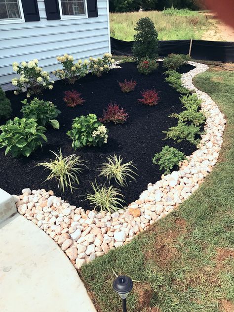 Love the large stone pick Exterior Rock Landscaping, Flower Bed With Mulch And Rocks, Flower Bed With Rock Border, Stone Flower Beds In Front Of House, Rock And Plants Landscaping, Rock Garden Flower Bed Designs, Rocks And Mulch Landscaping, Rock In Flower Bed Landscaping, Stone Flower Bed In Front Of House