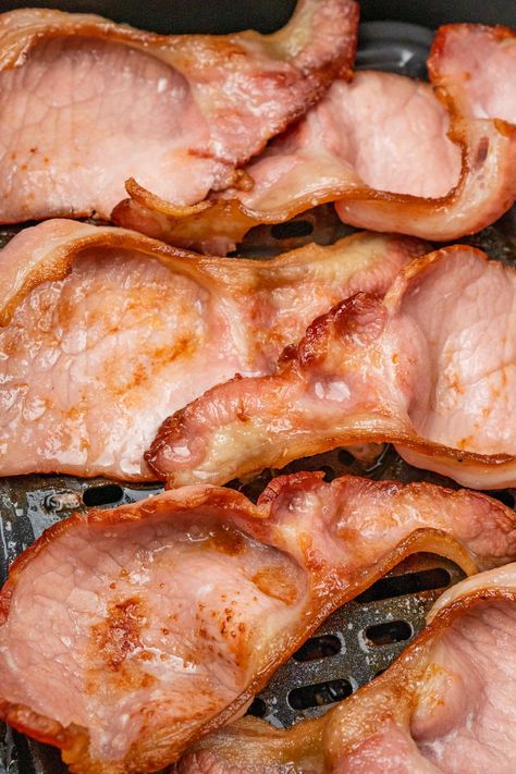 Thick cut back bacon perfectly cooked in an air fryer. For delicous crispy bacon without all the grease. Peameal Bacon In Air Fryer, Air Fryer Peameal Bacon, Cook Bacon In The Air Fryer, How To Air Fry Bacon, How To Cook Bacon In Air Fryer, Air Fryer Bacon Crispy, Airfryer Bacon, Bacon In Air Fryer, Bacon Air Fryer