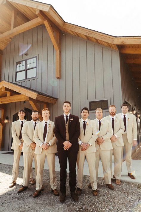 Black And Tan Suit Men, Mocha Groomsmen Attire, Tan Groomsmen Suits Black Groom, Neutral Tuxedo Wedding Grooms, Tan Brown Groomsmen Attire, Brown Tux Wedding Party, Chocolate Brown Groomsmen Suits, Tan Suit With Black Tie, Wedding Suits Groom Dark Skin