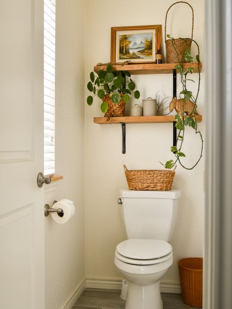 Shelves toilet room master bathroom shelf styling plants Shelves Behind Toilet, Room With Shelves, Bathroom Shelving Ideas, Small Half Bathroom, Shelves Above Toilet, Neutral Bathroom Decor, Dekorere Bad, Above Toilet, Very Small Bathroom