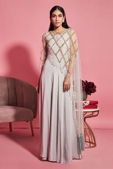 Buy Sanya Gulati Grey Net Gown With Embroidered Asymmetric Cape Online | Aza Fashions Cape Dress Indian, Asymmetrical Cape, Burgundy Gown, Cape For Women, Grey Gown, Net Gowns, Indian Bridesmaids, Diwali Outfits, Grey Jumpsuit