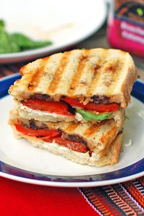 This red pepper and goat cheese panini has a layer of olive tapenade topped with roasted red pepper and soft, creamy goat cheese. Grilled perfection! | pinchofyum.com Tapenade Sandwich, Panini Party, Panini Ideas, Red Pepper Goat Cheese, Veggie Sandwiches, Cheese Panini, Panini Recipe, Panini Maker, Pinch Of Yum