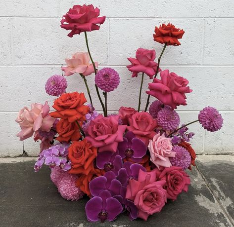 Pink And Orange Flower Arrangements Table, Pink Red Floral Arrangement, Purple Pink Orange Wedding Flowers, Pink Purple And Orange Party Decorations, Red Pink Purple Wedding Flowers, Pink And Red Floral Arrangements, Red Flower Arrangements, Pink Purple Wedding, Orange And Pink Wedding