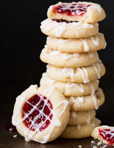 Raspberry Almond Snowball Cookies (jam stuffed snowballs) - Cooking Classy Almond Meltaways, بيتي فور, Cookies With Icing, Raspberry Thumbprint Cookies, Meltaway Cookies, Jam Thumbprint Cookies, Raspberry Jelly, Best Christmas Cookie Recipe, Thumbprint Cookies Recipe