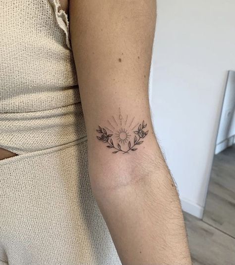 Tattoos Above Elbow Crease, Boho Wrist Tattoo, Lower Bicep Tattoo Women, Above The Elbow Tattoo Women, Boho Tattoo Ideas Hippie Bohemian, Tattoo Behind Arm Above Elbow, Whimsical Tattoos For Women, Peace Tattoos For Women, Behind Elbow Tattoo Women