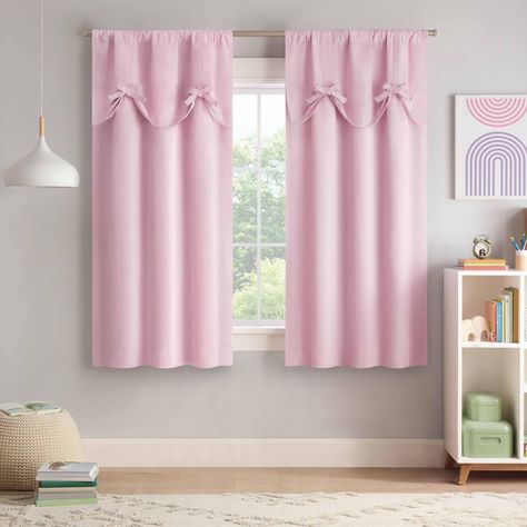 PRICES MAY VARY. 100% Polyester Dress Up Your Window With Eclipse Blackout Curtain: Bring stylish function to your kids room decor with our Kids Bow Tie Up Thermaback 100% Blackout Curtain. Our blackout curtain panel features an attached decorative valance with a tacked bow Thermal Blackout curtain: Our blackout curtain bring decorative and functional style to your space. Thermaback coating wards off summer heat & chilly winter drafts. Ensure privacy in your bedroom, kids room, playroom or nurse Nursery Curtains Girl, Pink Curtains Nursery, Nursery Blackout Curtains, Girls Room Curtains, Kids Blackout Curtains, Tie Up Valance, Pink Blackout Curtains, Kids Room Curtains, Tie Up Curtains