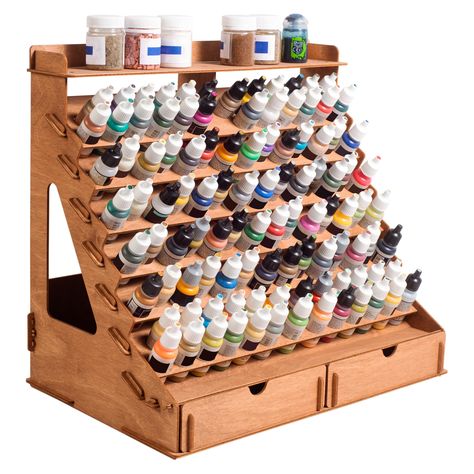 PRICES MAY VARY. Package info – The wooden paint storage rack contains 105 holes (1 inch diameter) and we think that this quantity is suitable for an artist of any level of professionalism. Also, Vallejo paint rack organizer has 14 holes for paintbrushes and two drawers, which are convenient to store other tools. For your comfortable art, we've added 6 stands for miniatures in our Vallejo paint rack set. Thereby you will be able to paint even the smallest details! Perfect solution for your comfo Paint Organizer, Paint Holder, Craft Paint Storage, Paint Bottles, Paint Rack, Paint Organization, Vallejo Paint, Paint Brush Holders, Brush Storage