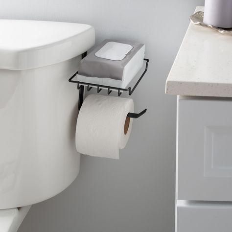 "Find the Bath Bliss Black Over the Tank Tissue Dispenser & Wipe Holder at Michaels. com. This innovative dispenser features an over the tank mechanism, allowing for easy installation without the need for drilling or additional hardware. Simply hang it over the tank of your toilet, and you're good to go. Designed with practicality in mind, your toilet paper is always within arm's reach, ensuring a seamless bathroom experience. This innovative dispenser features an over the tank mechanism, allowi Bathroom Wipes Holder, Tiny Bathroom Sink, Bathroom Wipes, Diy Toilet Paper Holder, Tiny Powder Room, Wipes Holder, Stacked Laundry Room, Wipe Holder, Guest Bathroom Decor