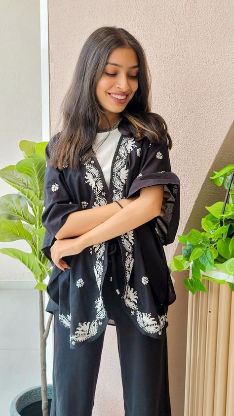 Shrug ideas, indo western outfit, styling. Tank Top With Shrug, Indo Western Outfit, Western Embroidery, Black Shrug, Western Outfit, Indo Western, Black Tank Top, Black Trousers, Wide Legs