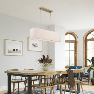 This 4-light chandelier is a balanced blend of simplicity and elegance that's sure to bring style and illumination to your modern space. It showcases a hardback rectangular shade that's crafted from a linen fabric blend for a textured look, and it aims the light all around your kitchen island or dining room from four bulbs up to 40W, which are sold separately. The handmade chandelier hangs from two metal downrods that are height adjustable to accommodate rooms big and small. Plus, it's dimmable Linear Chandelier Dining Room, Handmade Chandelier, Chandelier Metal, Dining Room Light Fixtures, Rectangle Chandelier, Dining Lighting, Livex Lighting, Drum Chandelier, Dining Room Chandelier