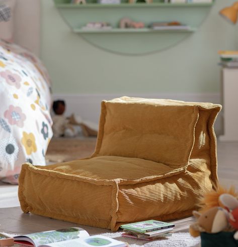 Lounging made easy. Estelle, our mustard mini beanbag is your child&apos;s new best friend. With a big seat and sloped back in soft cord fabric, they&apos;ll be resting comfortably in no time. From gaming to reading, chill in this contemporary chair. Fancy a change of scene? Just pick it up and plop it down. Now that&apos;s the way to relax. Made from polyester. Size H48, W55, D65cm. 5.5kg. Wipe clean. Passes UK FR regulations. Childrens Reading Corner, Toddler Bean Bag, Reading Corner Kids, Chill Out Room, Kids Rooms Inspo, Toddler Boy Room Decor, Dream Dining Room, Box Room, Boy Toddler Bedroom