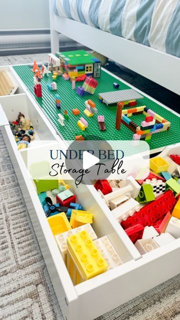 Courtney Bavis - PLAYROOM inspo on Instagram: "Comment “table” & I will send you the 🔗 directly to your DMs! (🇺🇸 only for this one! Sorry😢) You can flip the table to be roads instead of Lego base plates! This also makes it perfect for storing vehicles or train sets. I looked everywhere for under the bed storage like this for Legos and everything was so expensive! This is definitely the best option besides making it yourself. and the best part is? My kids are actually using it every day!🙌🙌 . . . . . #toyorganization #kidsorganization #legostorage #toystorage #toystorageideas #organizationideas #amazonkids #amazonkidsfinds #amazonfinds #amazonmusthaves #legostorageideas #legotable #playroominspo #kidsroominspiration #kidsroomideas #toddlerroom #playroomorganization #kidsplayroom #momso Underbed Train Table, Underbed Lego Table, Lego Storage Play Area, Lego Table Under Bed, Under The Bed Lego Table, Lego Storage Under Bed, Under Bed Train Table, Train Table To Lego Table, Lego And Train Table