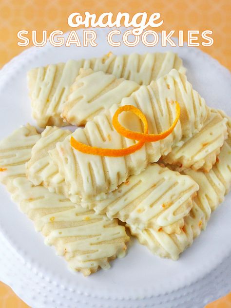 Delicious Orange Sugar Cookies are flavored with fresh orange zest and topped with a delicious orange glaze! Cut out into your favorite shapes for a delicious, sweet treat! Great year round! // Glorious Treats Orange Sugar Cookies, Fancy Treats, Cut Out Cookie Recipe, Baking Treats, Rolled Sugar Cookies, Orange Glaze, Flavored Sugar, Cookie Flavors, Fresh Orange