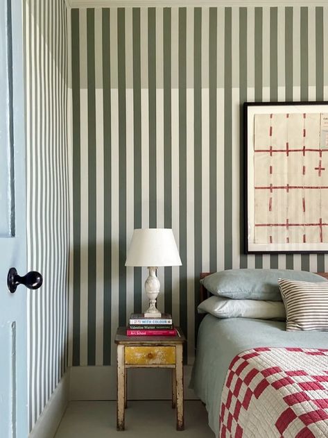 Good Striped Wallpaper Is Expensive—Painting the Pattern Is Not | domino Bunting Above Bed, Striped Wallpaper Bedroom, Striped Wallpaper Living Room, Decor Vignettes, Striped Bedroom, Hedda Gabler, Stripe Wall, Beach Bungalow, Striped Walls