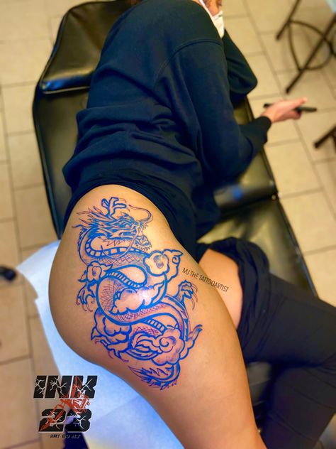 Blue Tattoos On Black Women, Blue Hand Tattoos For Women, Tattoo Ideas Blue Ink, Tattoos With Blue Ink, Blue Ink On Dark Skin, Blue Dragon Tattoo For Women, Dragon Thigh Tattoo Black Women, Blue Back Tattoo, Blue Tattoos On Brown Skin