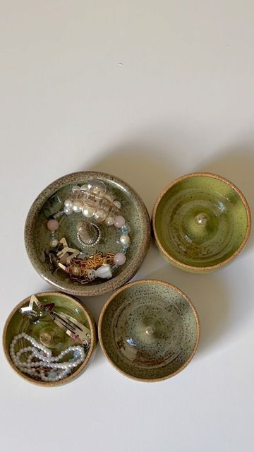 ˗ˏˋ 𝒓𝒂𝒄𝒉𝒆𝒍𝒍𝒆 ´ˎ˗ on Instagram: "jewelry dishes are one of my favorite things to throw on the wheel as an amateur potter because I think they pose a bit of a fun challenge to make. Shaping the ring holder bit and trimming these unwieldy-shaped things on a chuck leave a lot of room for things to go wrong— but every time I’ve made these, I’ve been very pleased with the outcomes. These are also so easy to customize, whether you’re looking to go crazy with glazes or make them larger for other Wheel Thrown Ring Holder, Wheel Clay Ideas, Things To Throw On The Wheel, Ceramics Wheel Ideas, Ceramics Throwing Ideas, Pottery Ideas Jewelry Holder, Easy Glazing Ideas Pottery, Jewelry Pottery Holder, Wheel Throwing Projects